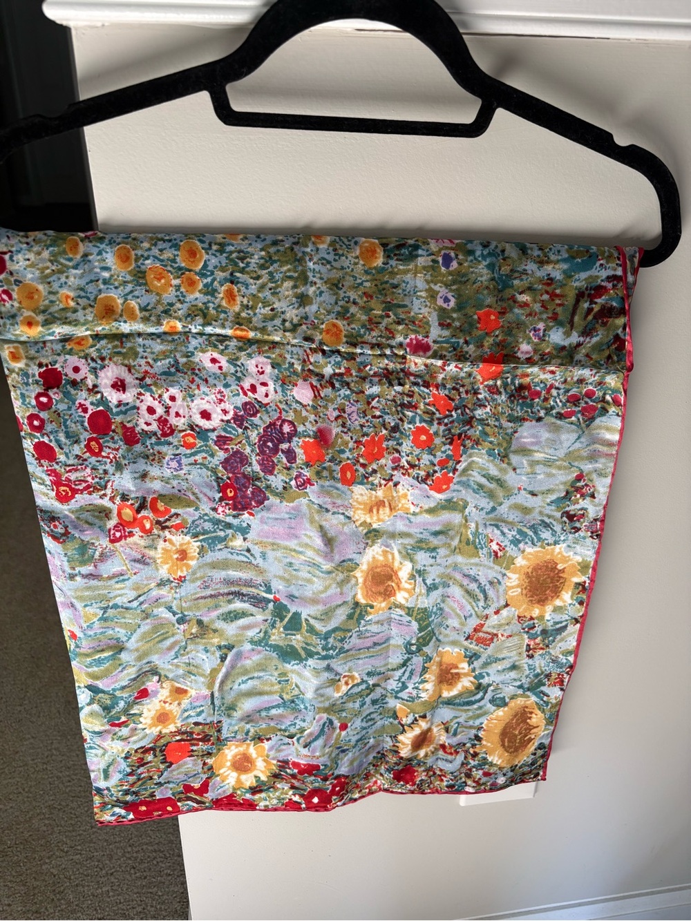 Silky scarf, sunflowers, etc with red piping. 34” x 34” square.